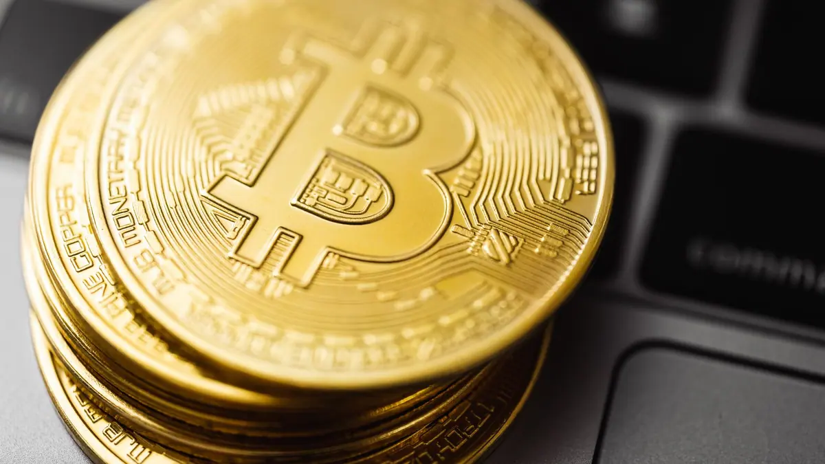 Photographie d'illustration sur le thème de Bitcoin et de l'achat de cryptomonnaies
